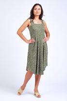 Woman wearing green print dress.