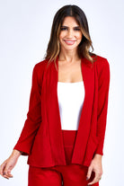 Woman wearing red jacket.