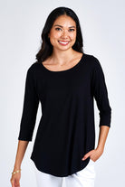 Woman wearing black top.