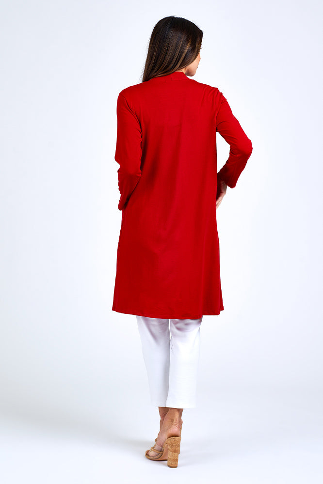 Woman wearing red long jacket.