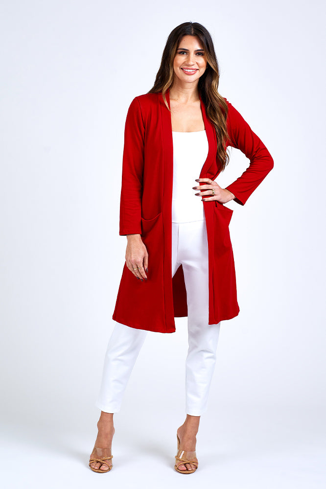 Woman wearing red long jacket.