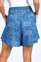 Woman wearing blue and white skort.